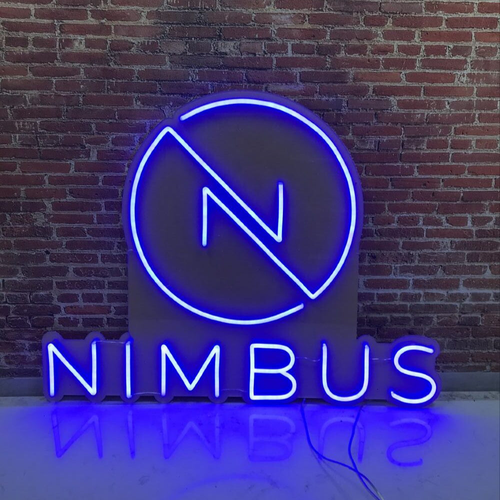 Neon sign with 'Nimbus' logo on a brick wall background